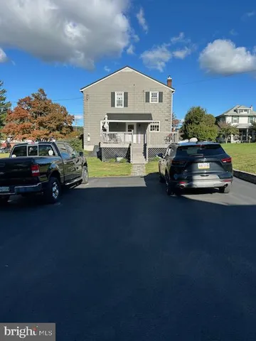 a house view with a garden space