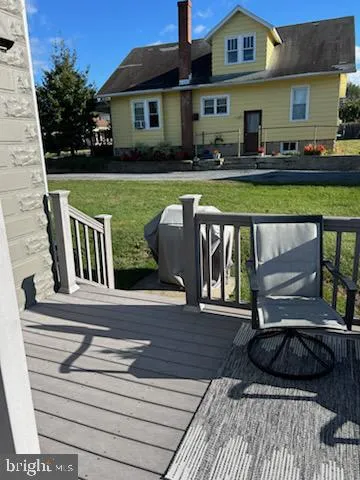 a view of a garden with an outdoor space