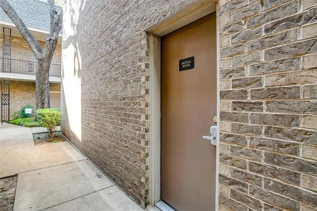 a view of a door and a street view