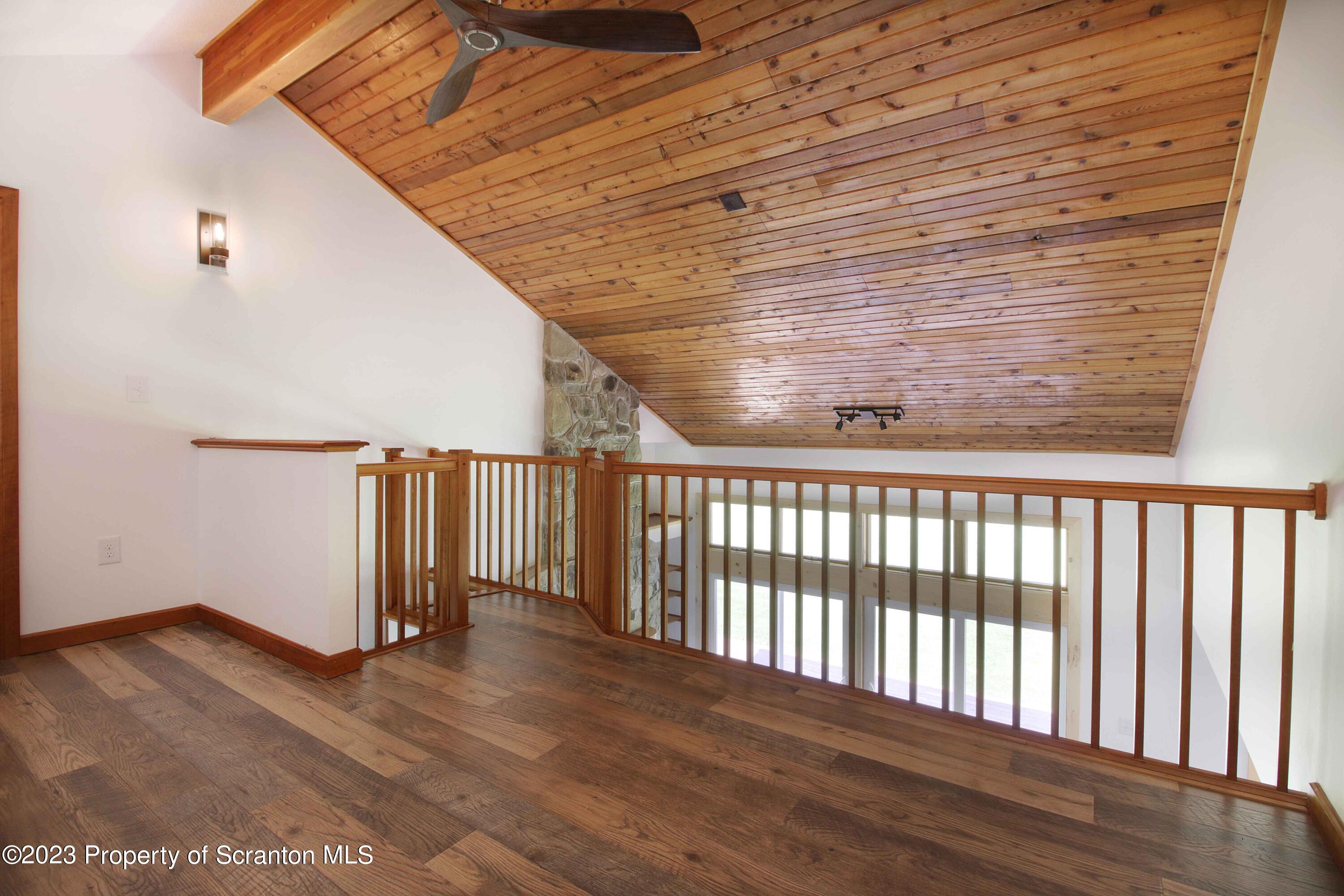 761 Day Road Montrose, PA 18801 - Photo 40 of 62 a view of a porch with wooden floor