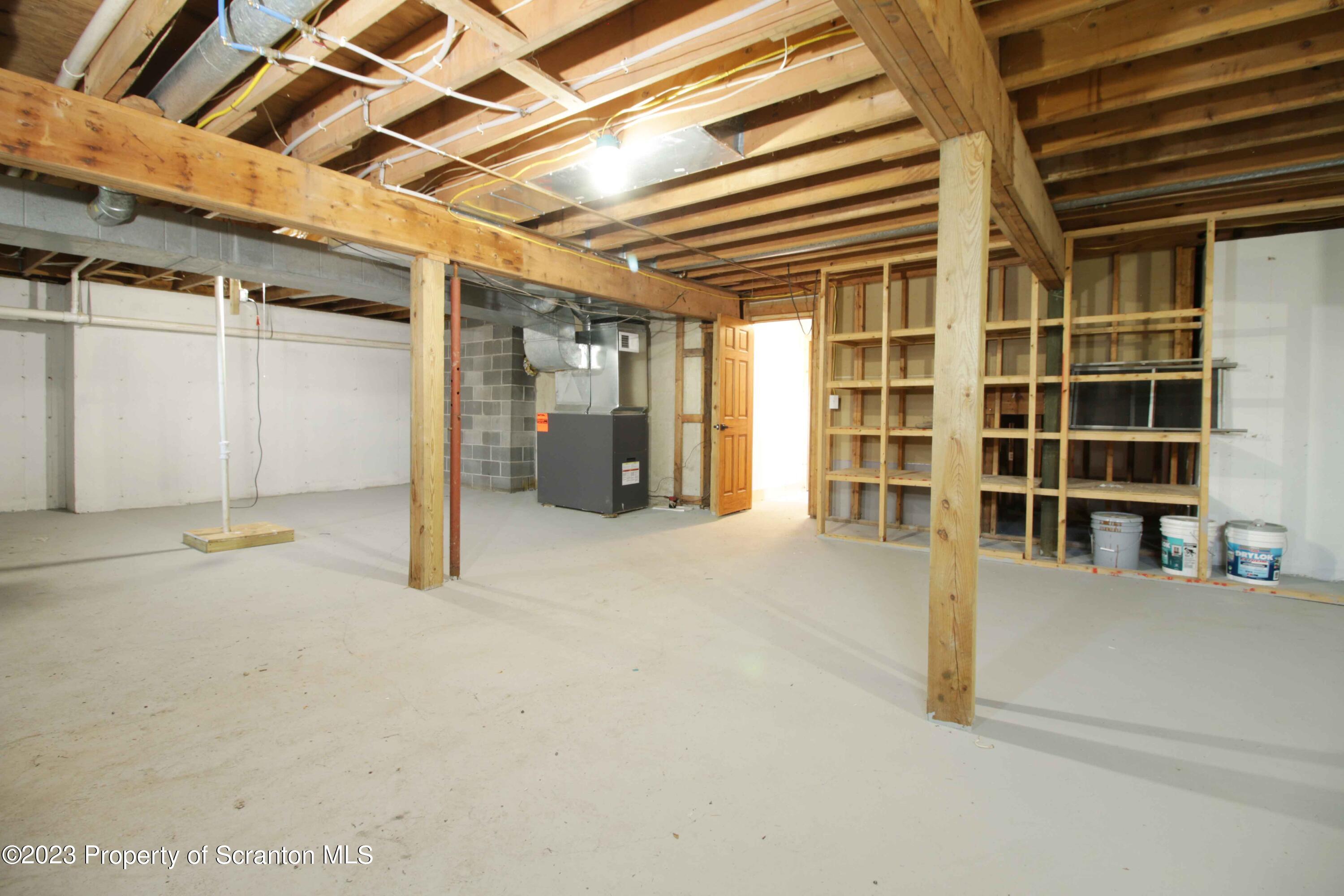 761 Day Road Montrose, PA 18801 - Photo 62 of 62 a view of an empty room with wooden shelves