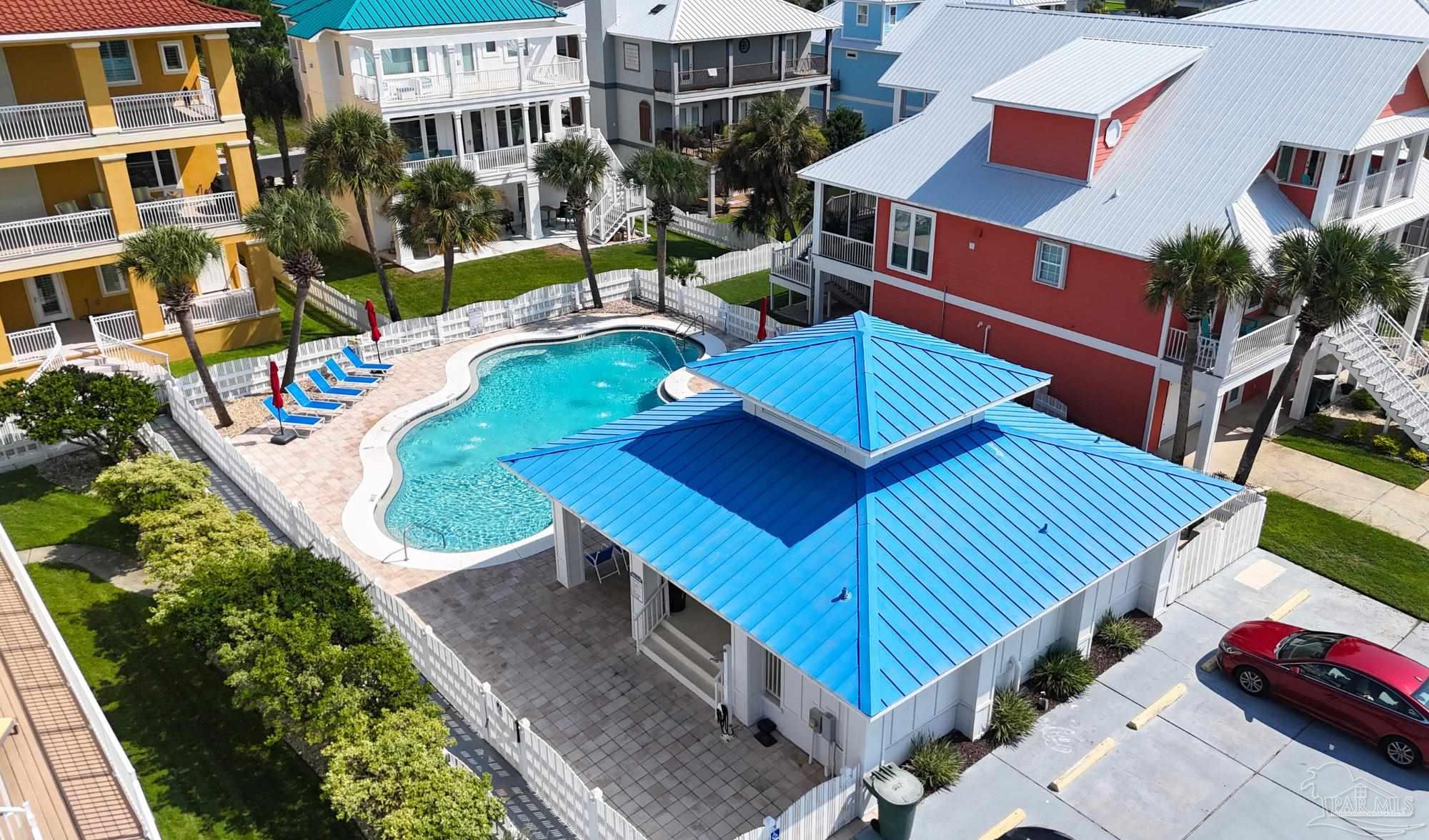 337 Gulfview Lane Perdido Key, FL 32507 - Photo 21 of 27 a view of an outdoor sitting area with a swimming pool