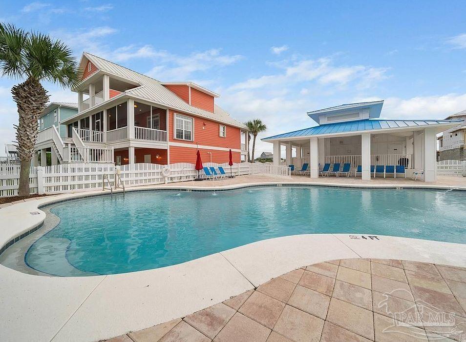 337 Gulfview Lane Perdido Key, FL 32507 - Photo 23 of 27 a view of a house with a yard