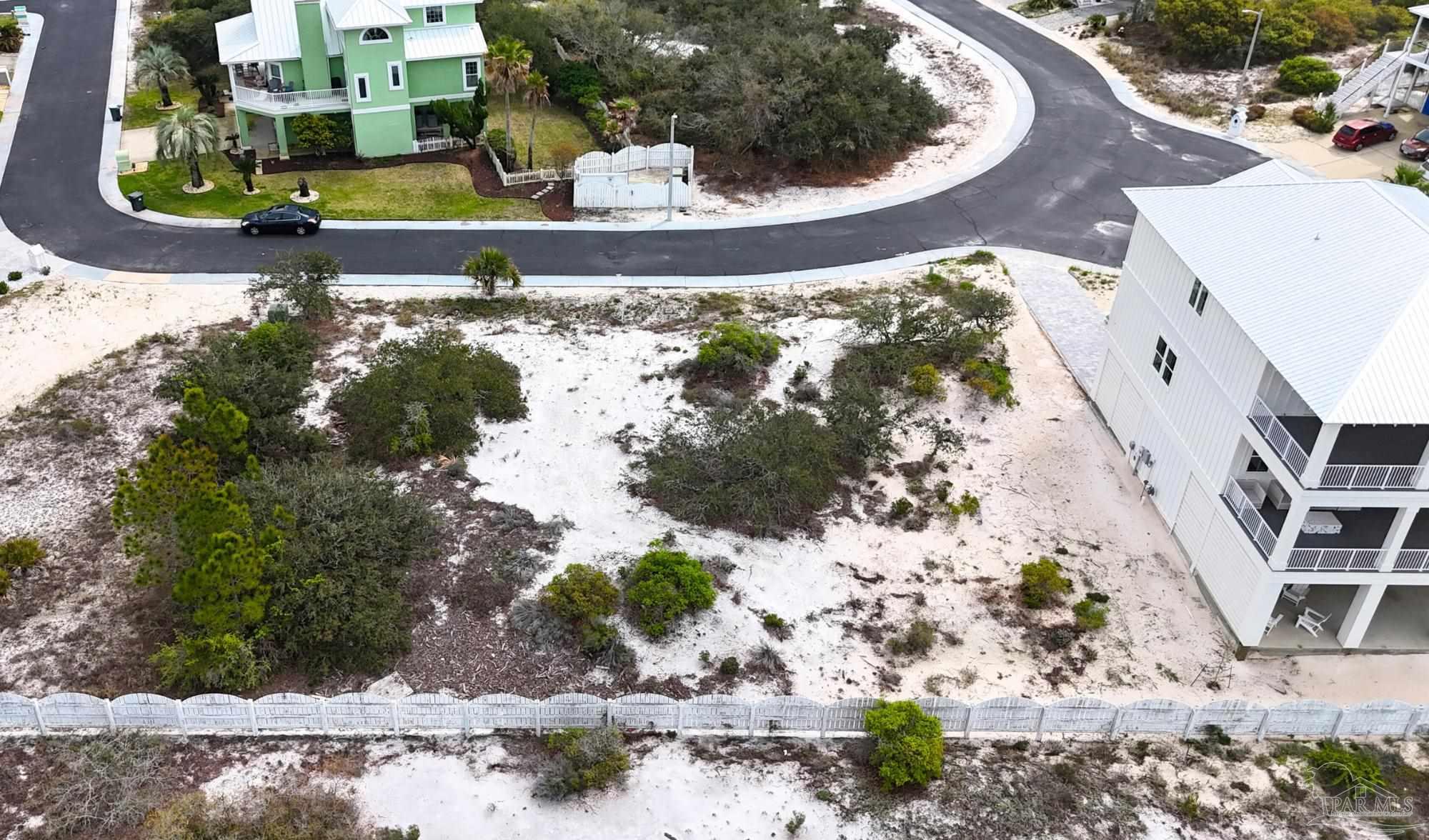 337 Gulfview Lane Perdido Key, FL 32507 - Photo 6 of 27 a view of a swimming pool with lawn chairs