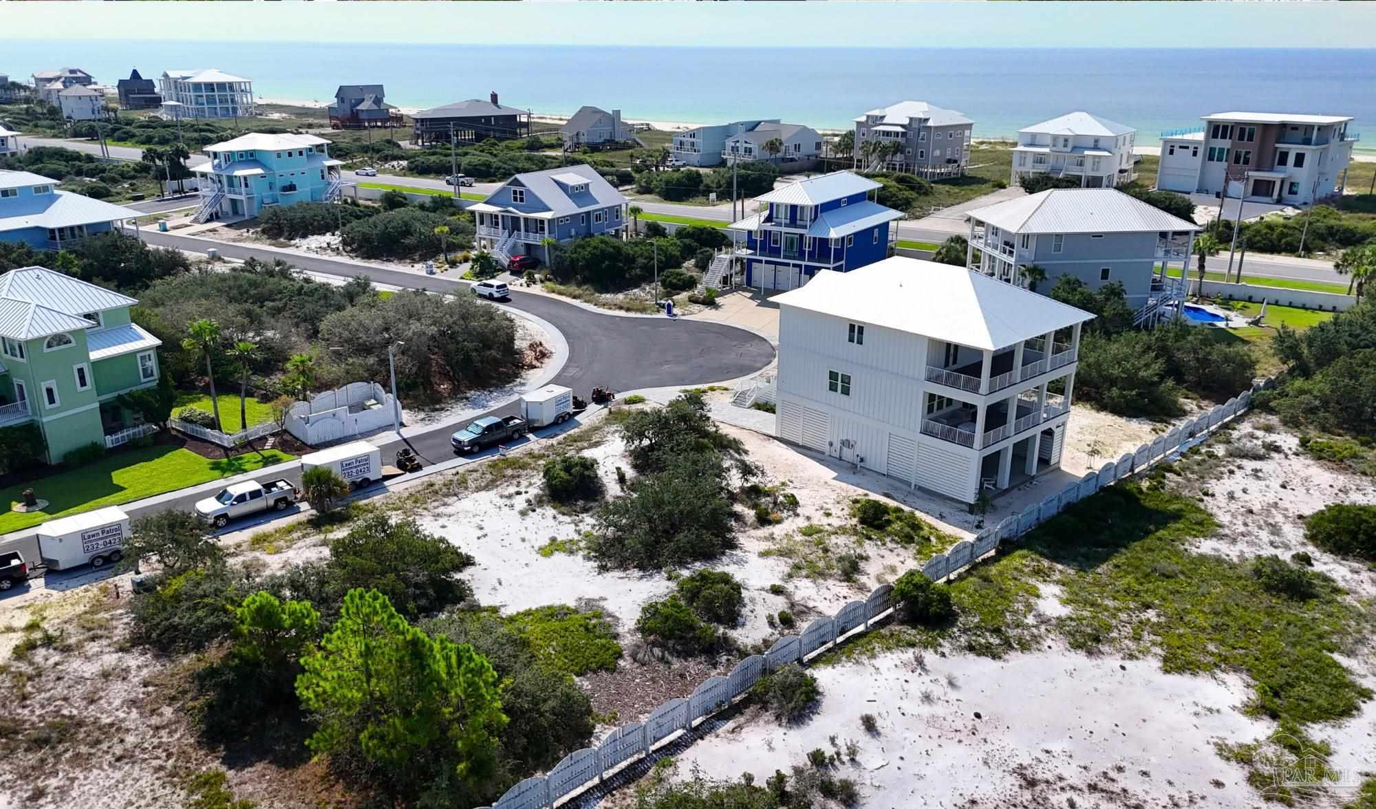 337 Gulfview Lane Perdido Key, FL 32507 - Photo 9 of 27 an aerial view of residential houses with outdoor space