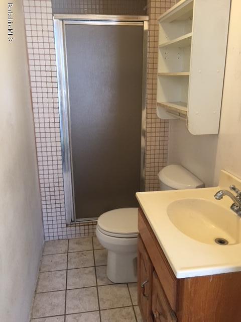 1458 Bancroft Road Becket, MA 01223 - Photo 9 of 19 a bathroom with a sink toilet and shower
