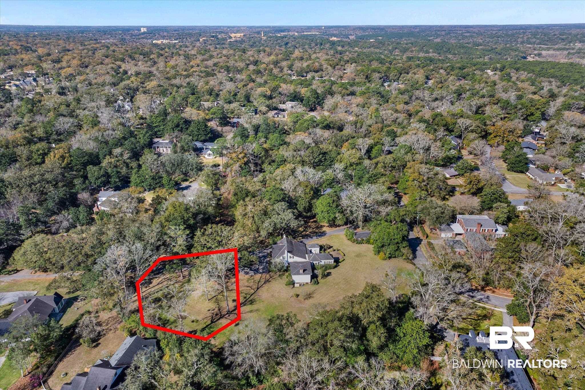 0 Austill Place Mobile, AL 36608 - Photo 3 of 14 Aerial view of property and surrounding area featuring property boundaries highlighted and a forest