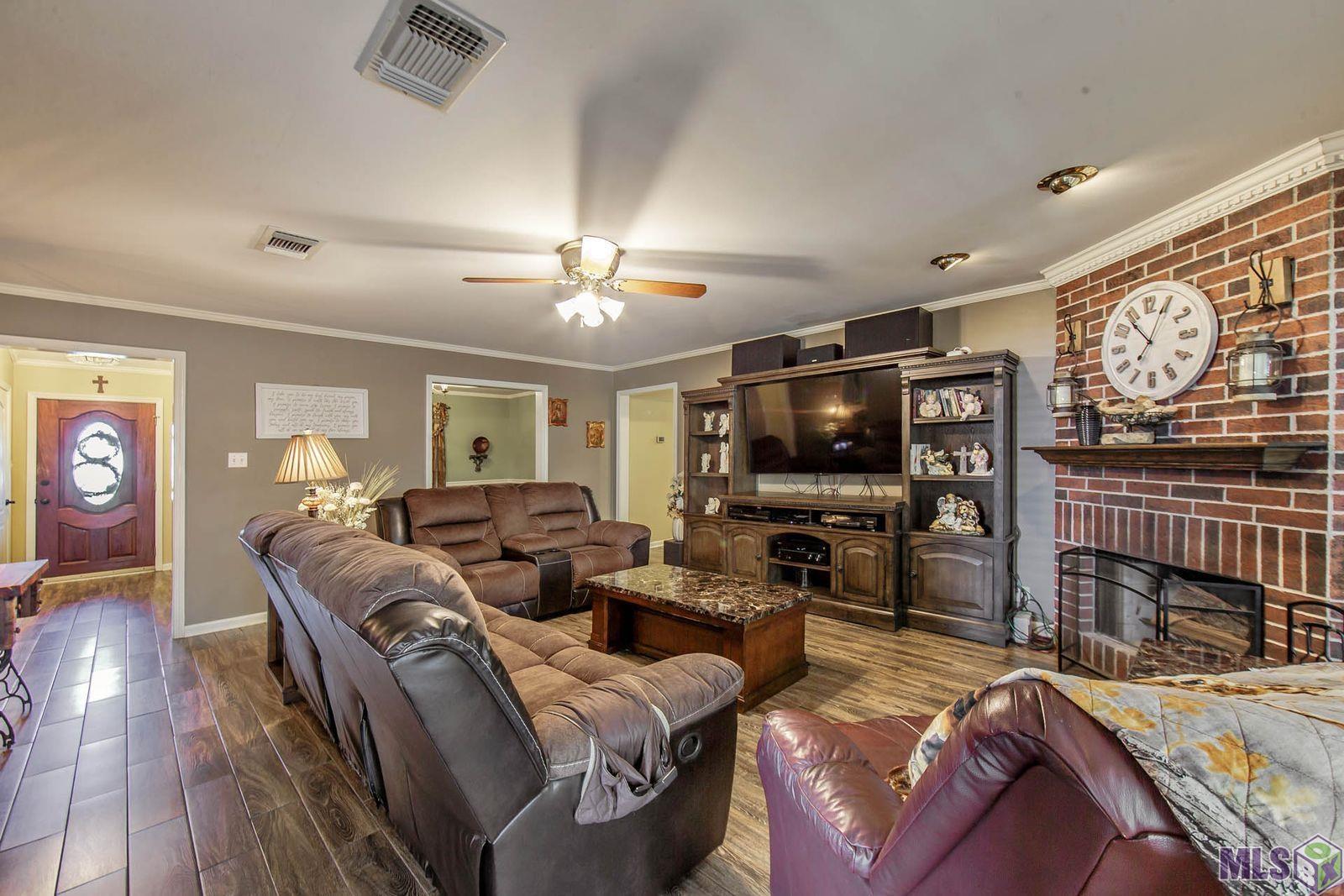 122 East 49th Street Cut Off, LA 70345 - Photo 17 of 24 DEN EXITS TO COVERED PATIO