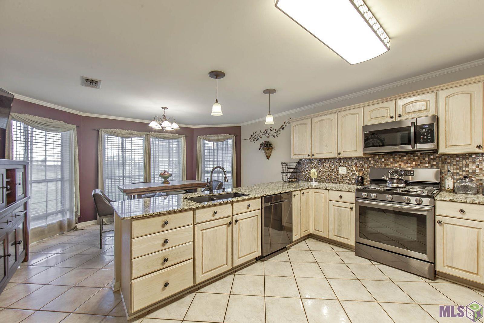 122 East 49th Street Cut Off, LA 70345 - Photo 8 of 24 KITCHEN WITH DINING AREA