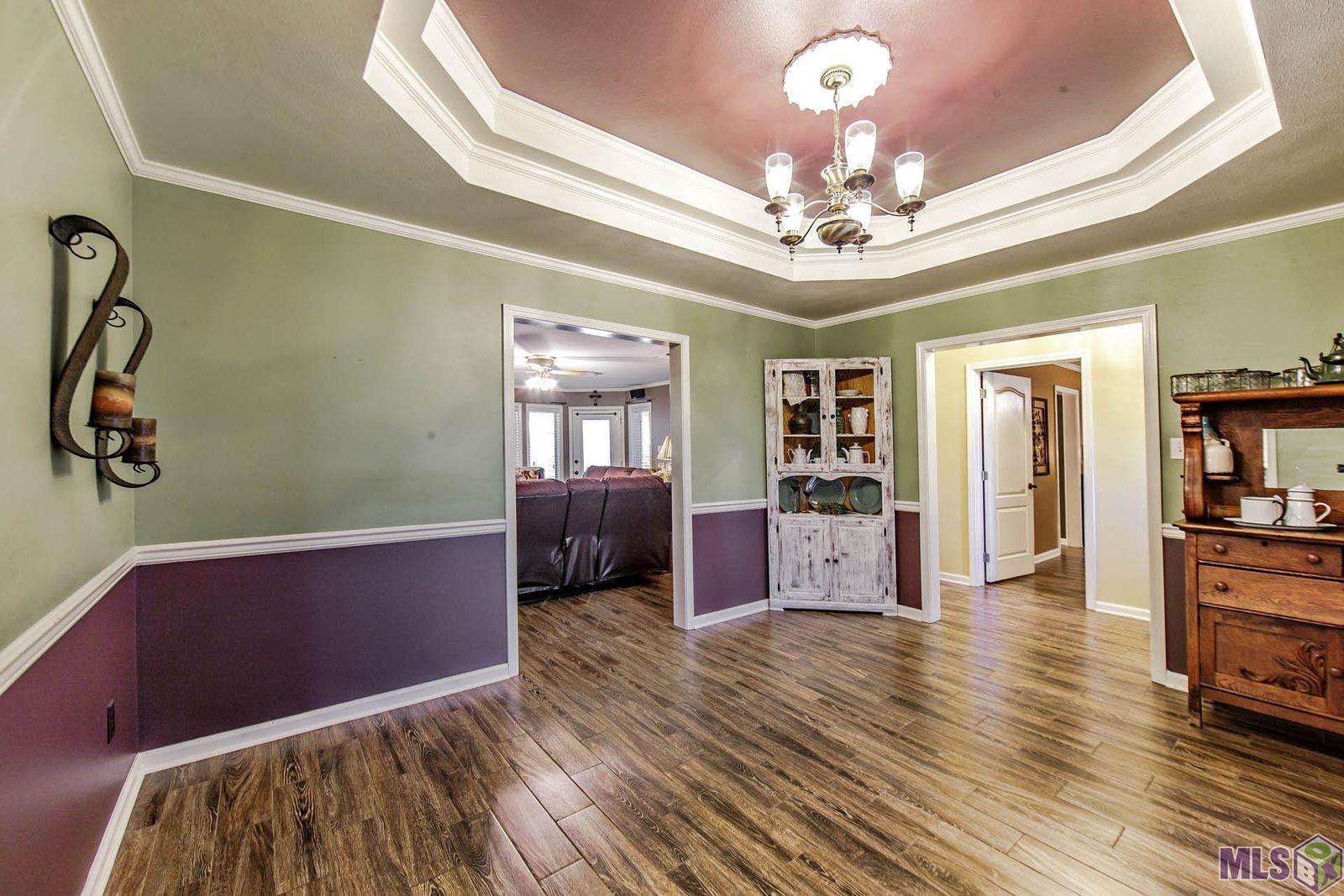 122 East 49th Street Cut Off, LA 70345 - Photo 9 of 24 FORMAL DINING TO KITCHEN