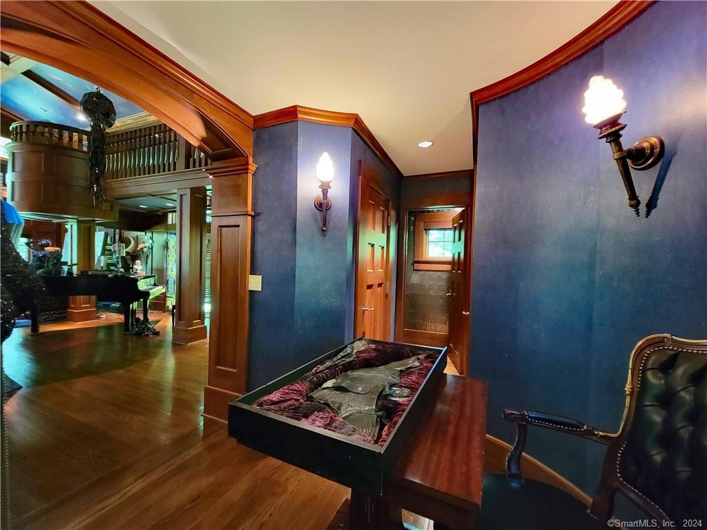 22 Ketcham Road Ridgefield, CT 06877 - Photo 11 of 40 a view of a livingroom with furniture and floor to ceiling window