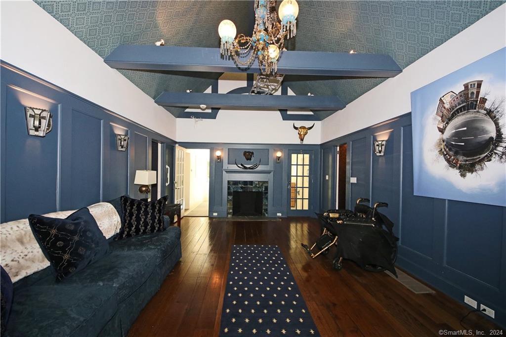 22 Ketcham Road Ridgefield, CT 06877 - Photo 22 of 40 a view of a dining room with furniture wooden floor and chandelier