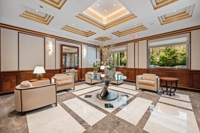 132 East Delaware Place, Unit 5201 Chicago, IL 60611 - Photo 3 of 42 a living room with furniture and a large window