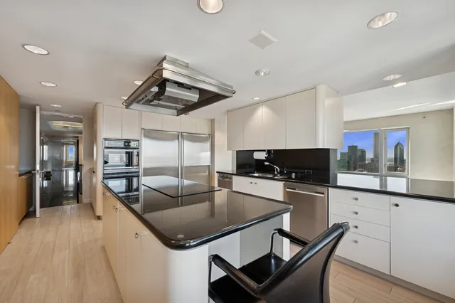 a kitchen with a stove and a microwave