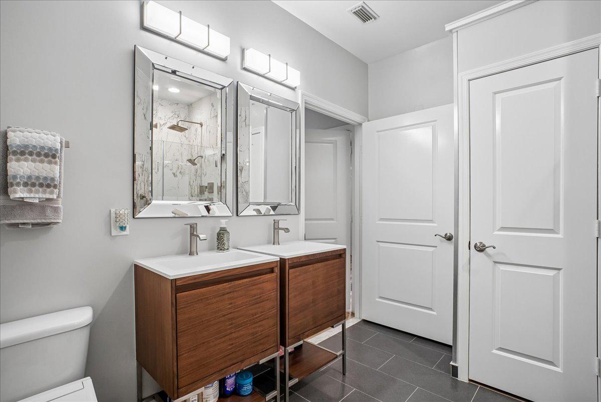 3650 South Glebe Road, Unit 157 Arlington, VA 22202 - Photo 16 of 54 Updated bathroom with double vanity
