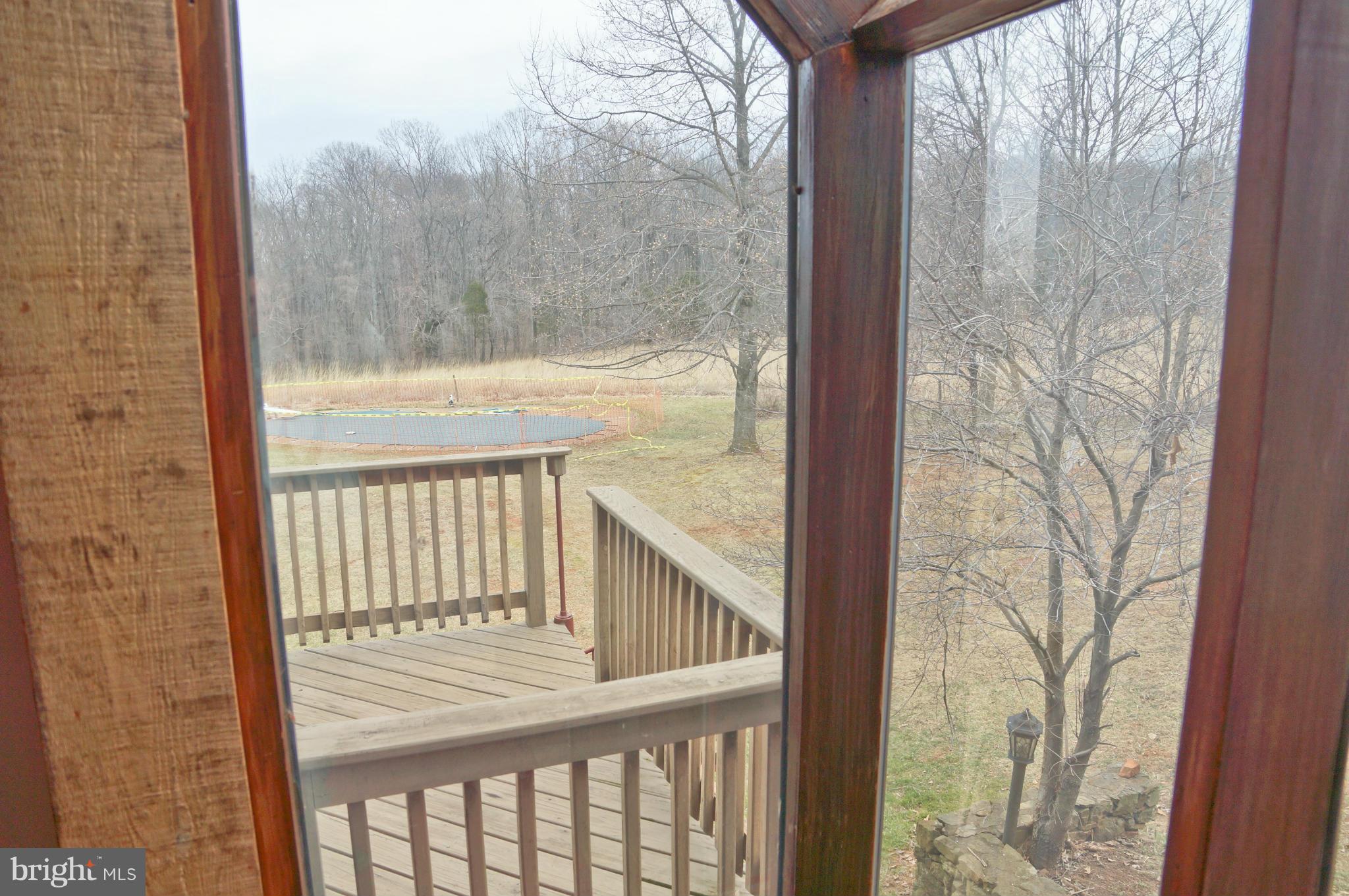 7133 Leeton Ridge Road Warrenton, VA 20186 - Photo 8 of 29 View from Living Room to Swimming Pool in back yar