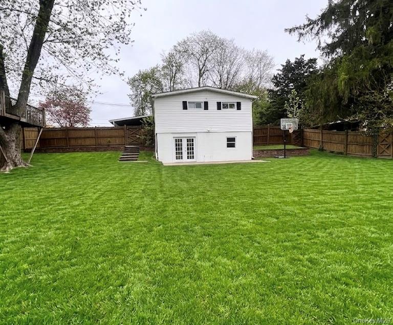 51 North Pascack Road Nanuet, NY 10954 - Photo 20 of 23 a white house with a big yard and large trees