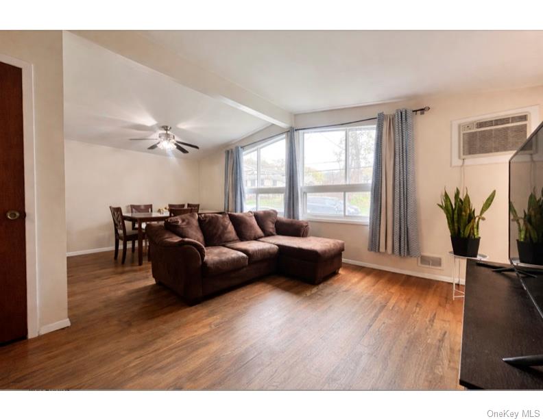 51 North Pascack Road Nanuet, NY 10954 - Photo 3 of 23 a living room with furniture and a large window