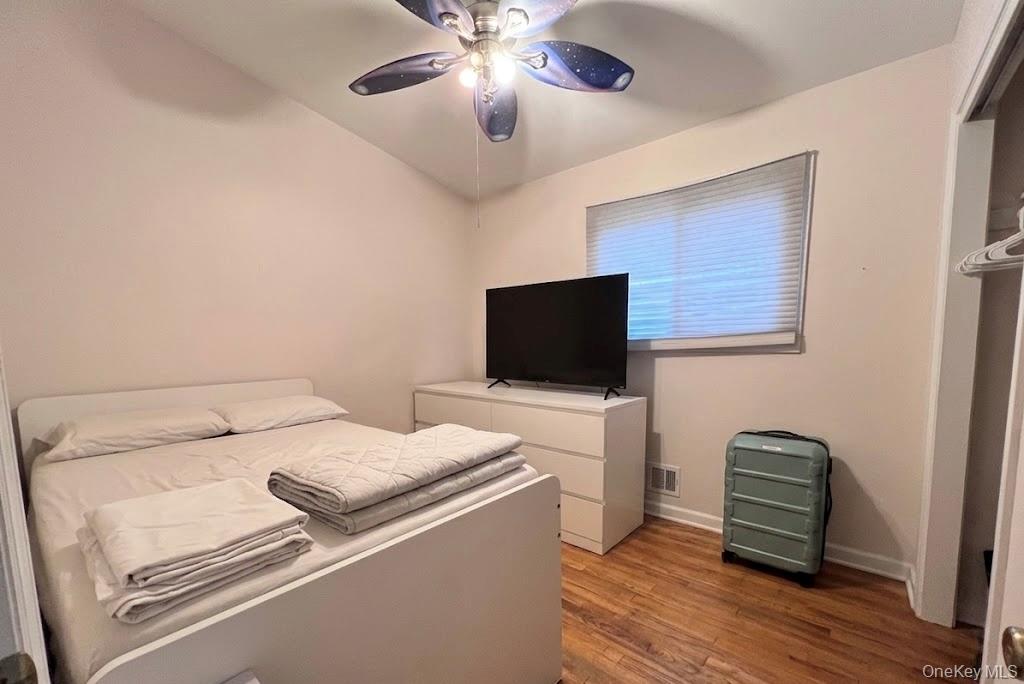 51 North Pascack Road Nanuet, NY 10954 - Photo 7 of 23 a bedroom with a bed and a television