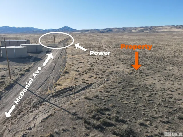 a backyard of a house with a yard and ocean view