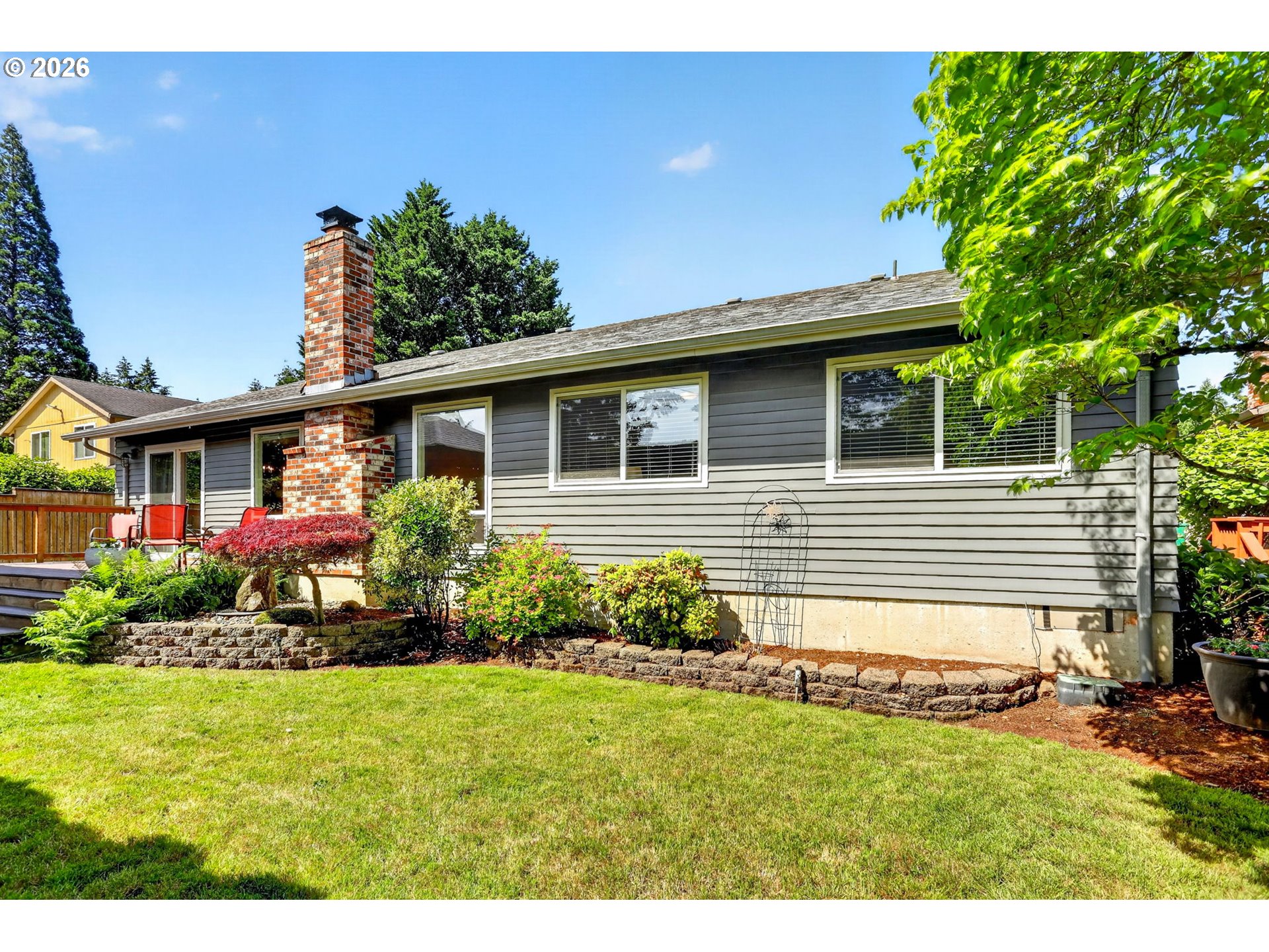 1776 Southeast 114th Place Portland, OR 97216 - Photo 45 of 47 a front view of a house with garden