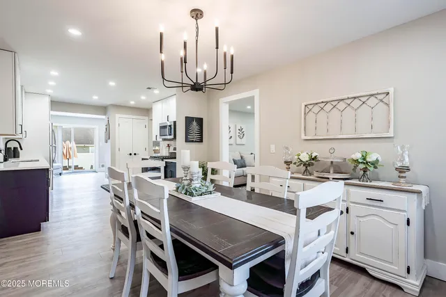 a room with furniture and air hockey table
