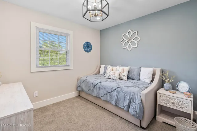 a kitchen with stainless steel appliances a stove a microwave and cabinets