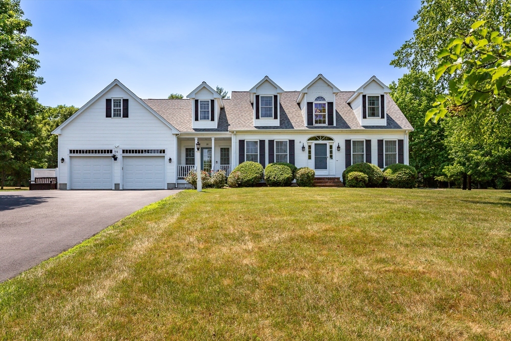 39 Nachaomet Road Lakeville, MA 02347 - Photo 2 of 42 a front view of house with yard and green space