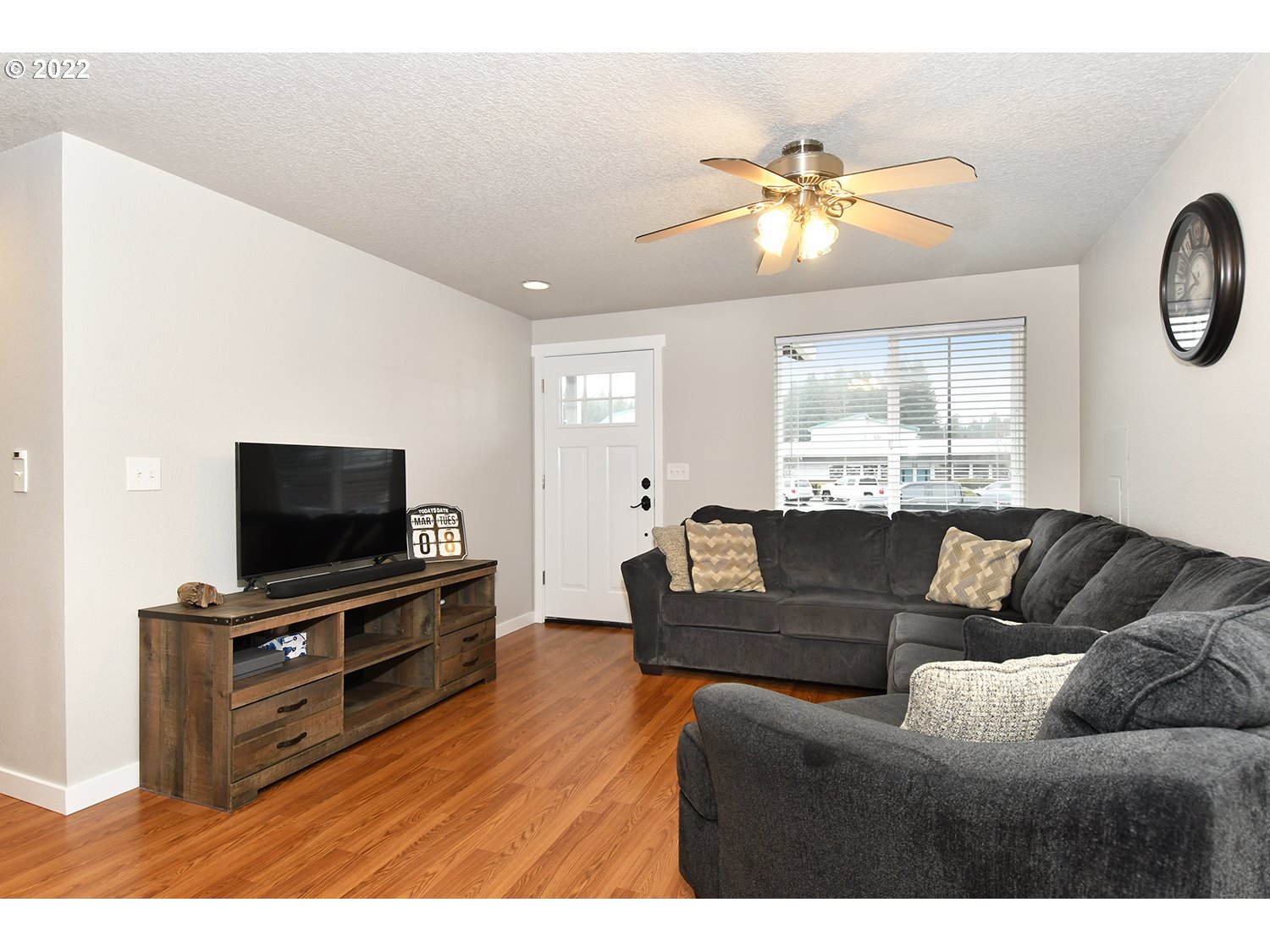 407 West Yacolt Road Yacolt, WA 98675 - Photo 6 of 21 a living room with furniture and a flat screen tv