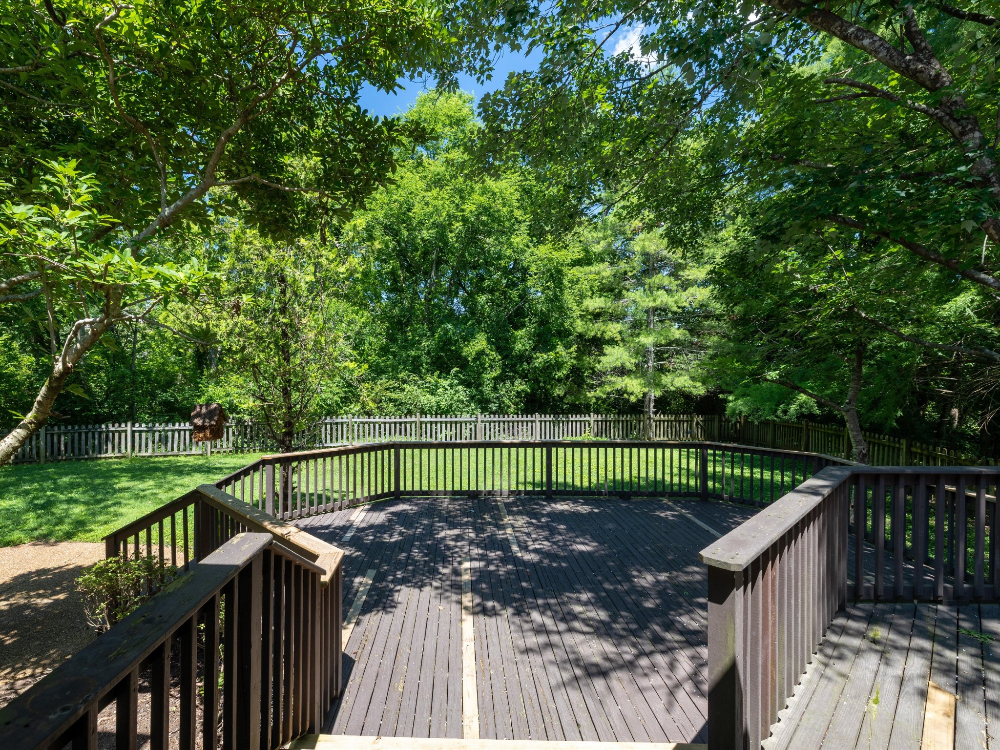 4629 Sandy Creek Road Nashville, TN 37221 - Photo 36 of 48 a green field with trees in the background