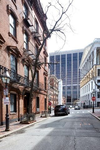 a view of a building with a street