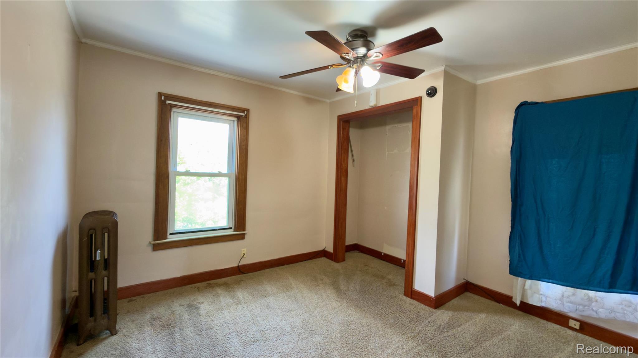 130 Elm Street River Rouge, MI 48218 - Photo 19 of 20 Neutral-toned walls complement the light-toned carpeting