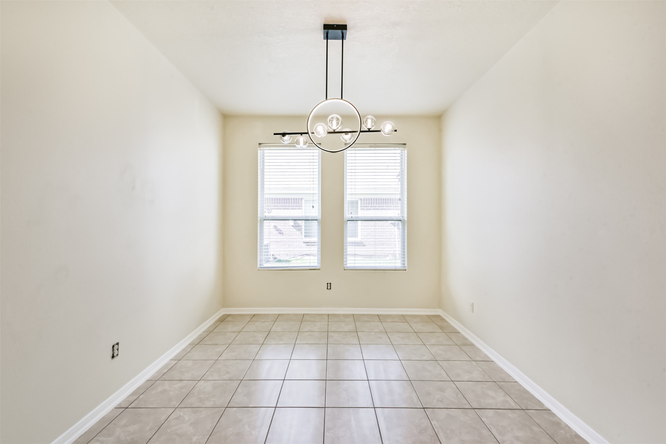 1810 Sun Point Court Humble, TX 77396 - Photo 13 of 38 a view of an empty room with a window