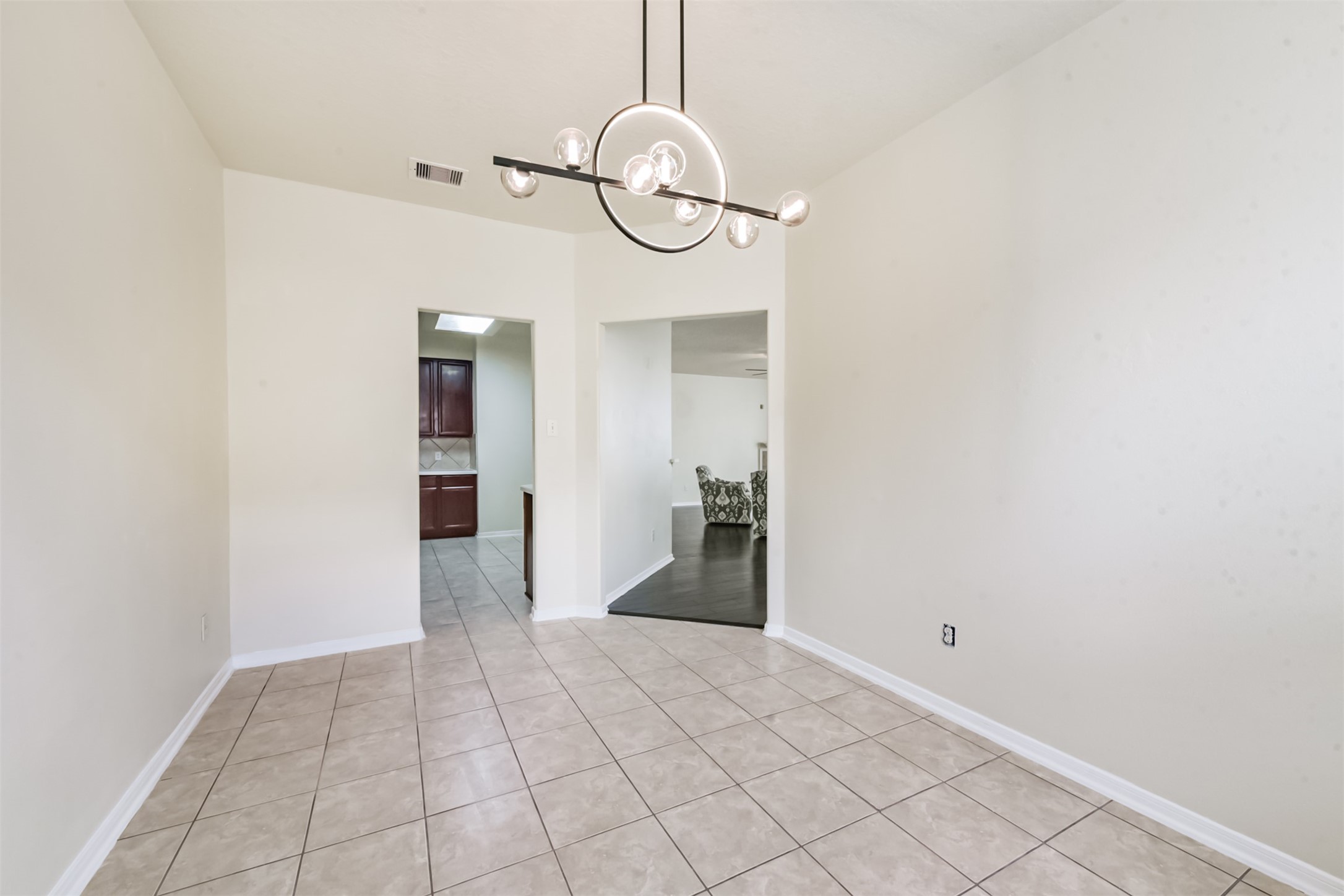 1810 Sun Point Court Humble, TX 77396 - Photo 14 of 38 a view of a room with wooden floor