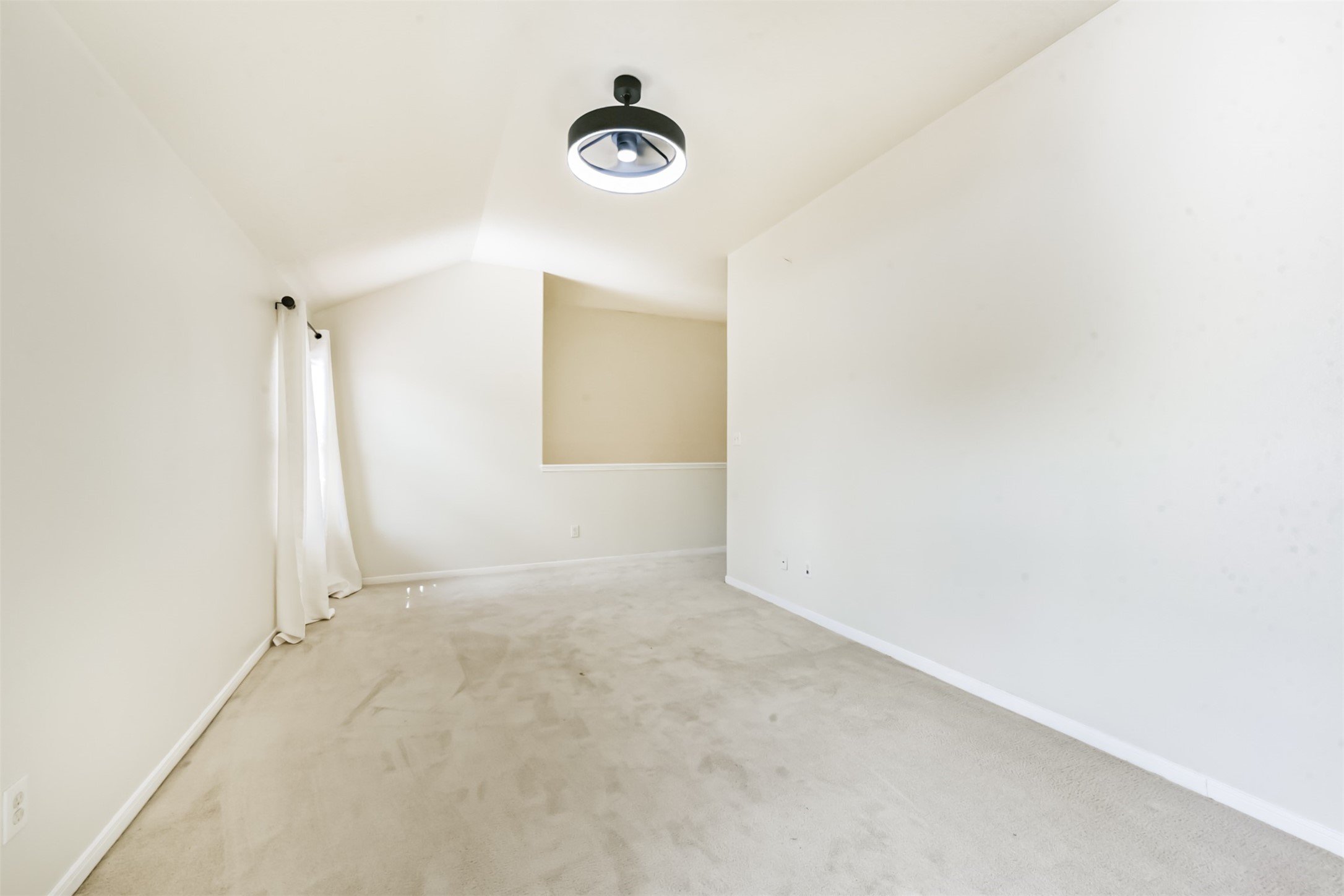 1810 Sun Point Court Humble, TX 77396 - Photo 22 of 38 an empty room with a window