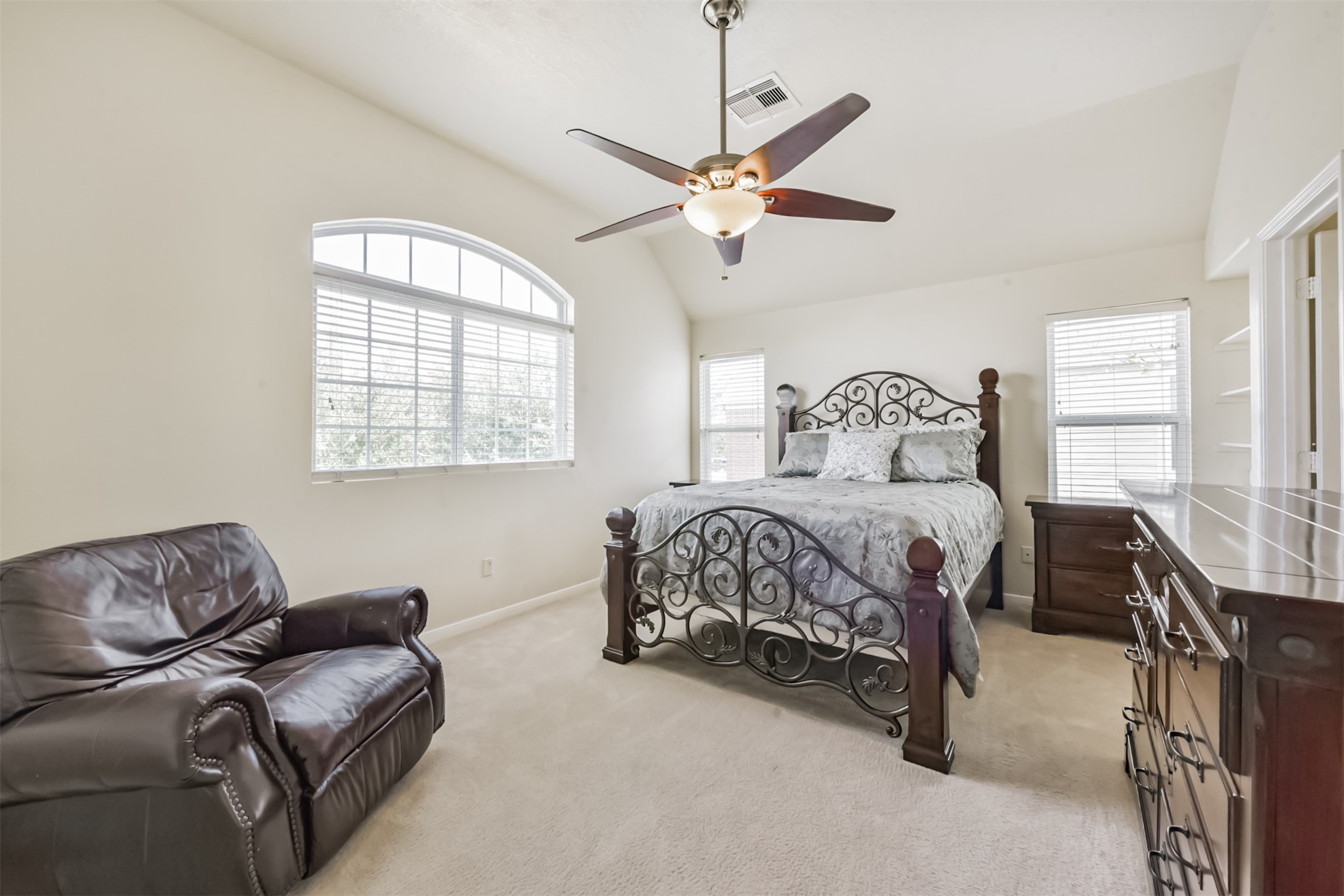 1810 Sun Point Court Humble, TX 77396 - Photo 23 of 38 a bedroom with a bed couch and window