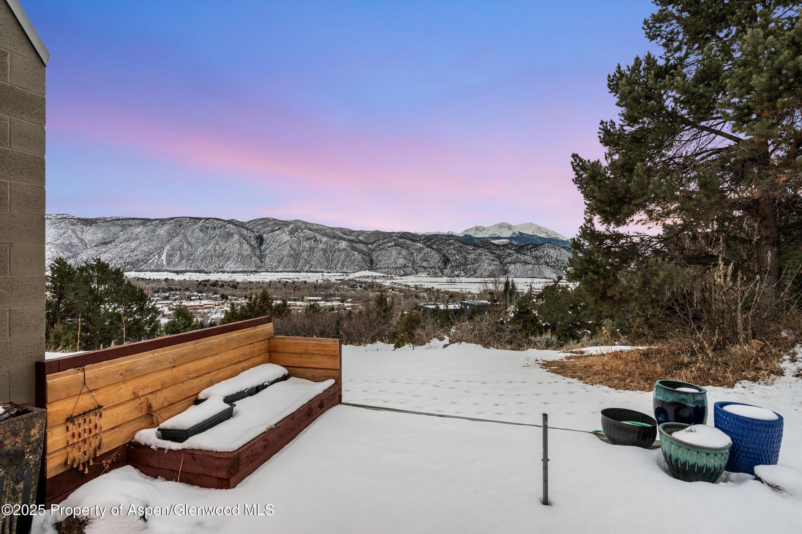 805 Pinon Drive, Unit 1 Basalt, CO 81621 - Photo 8 of 21 a view of a terrace with a lake view