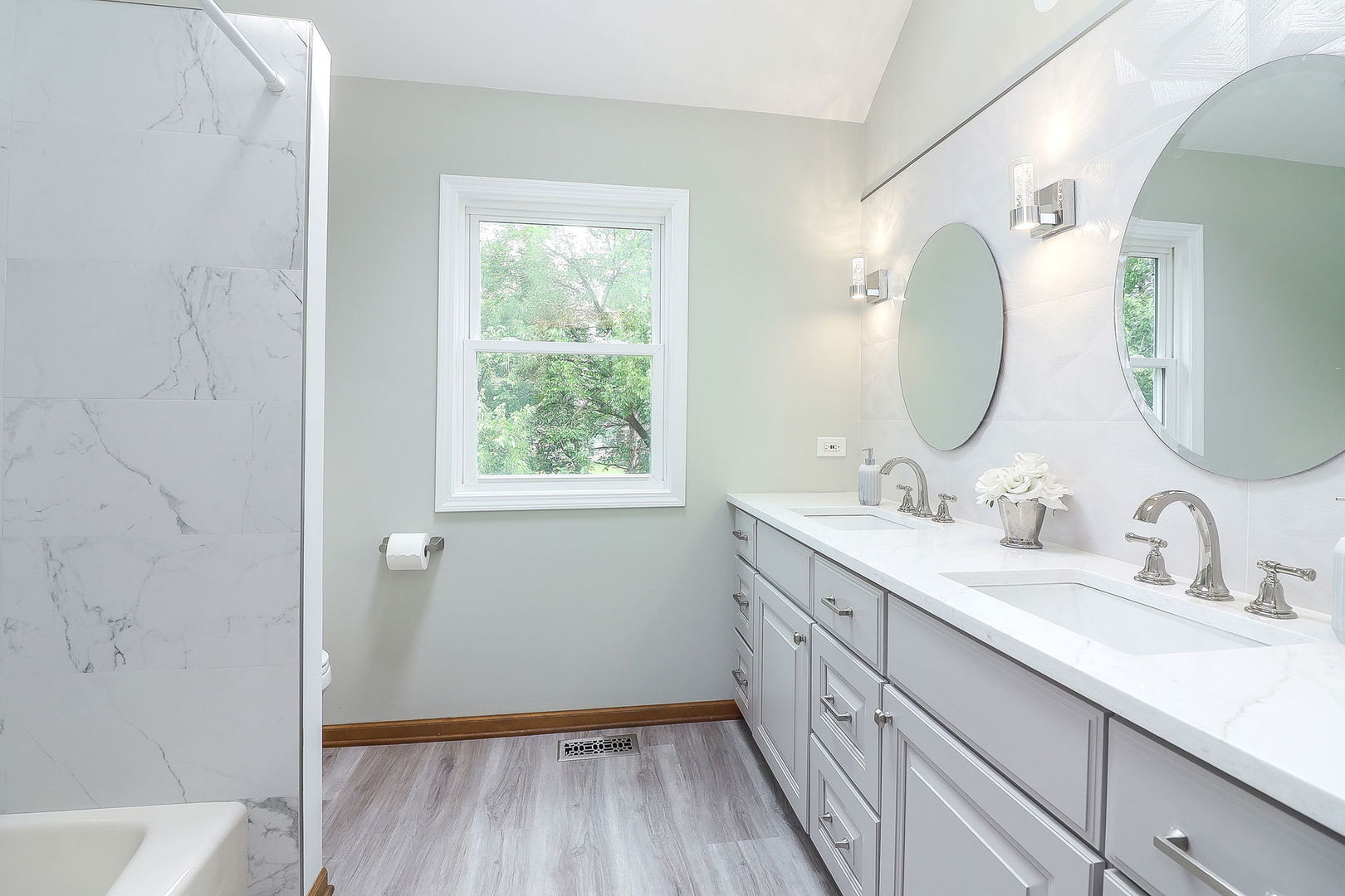 1736 Mundelein Road Naperville, IL 60565 - Photo 25 of 30 a bathroom with a double vanity sink and a mirror