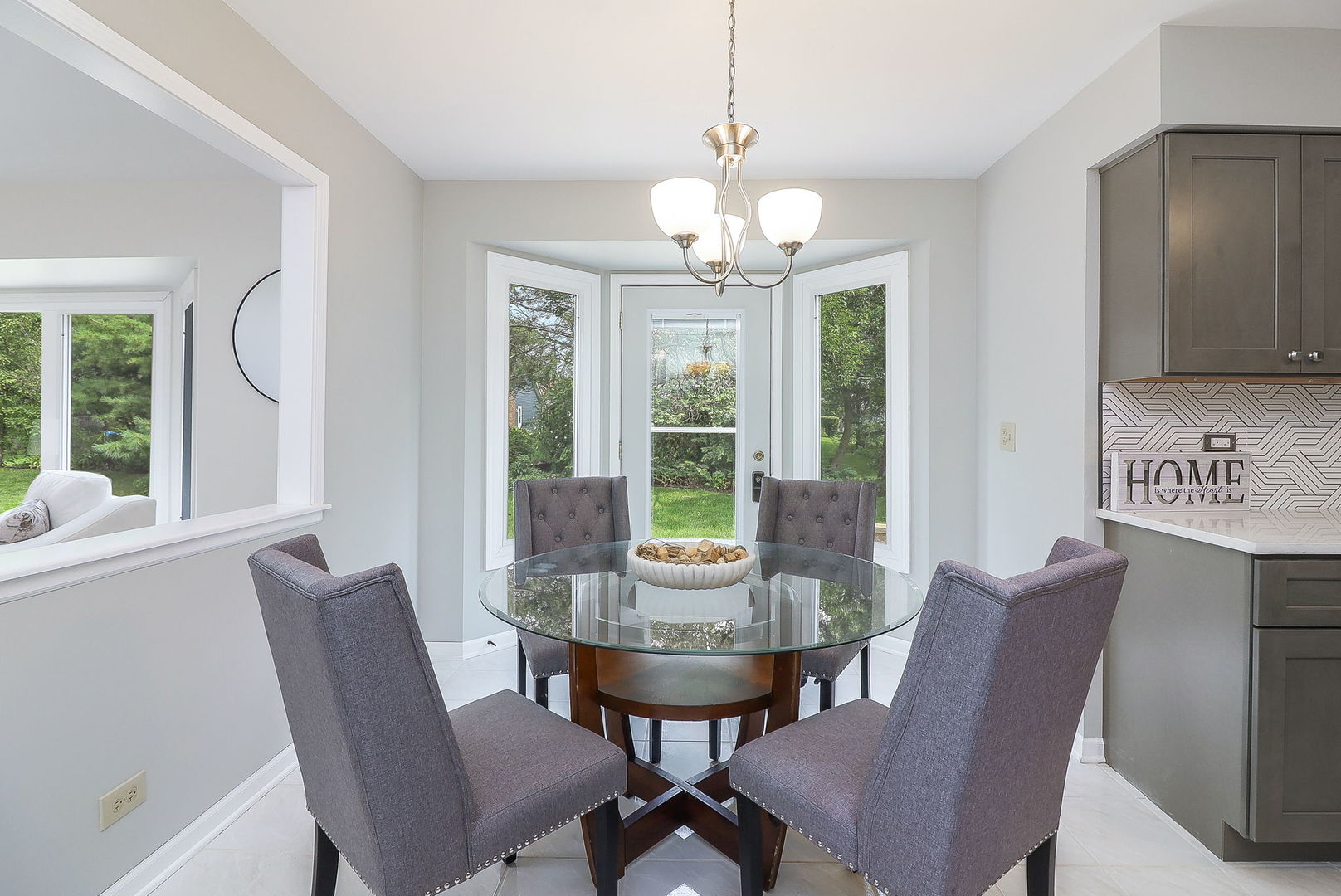 1736 Mundelein Road Naperville, IL 60565 - Photo 6 of 30 a view of a dining room with furniture window and outside view