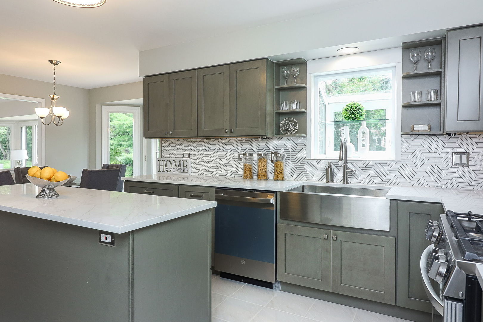 1736 Mundelein Road Naperville, IL 60565 - Photo 7 of 30 a kitchen with a sink cabinets and window