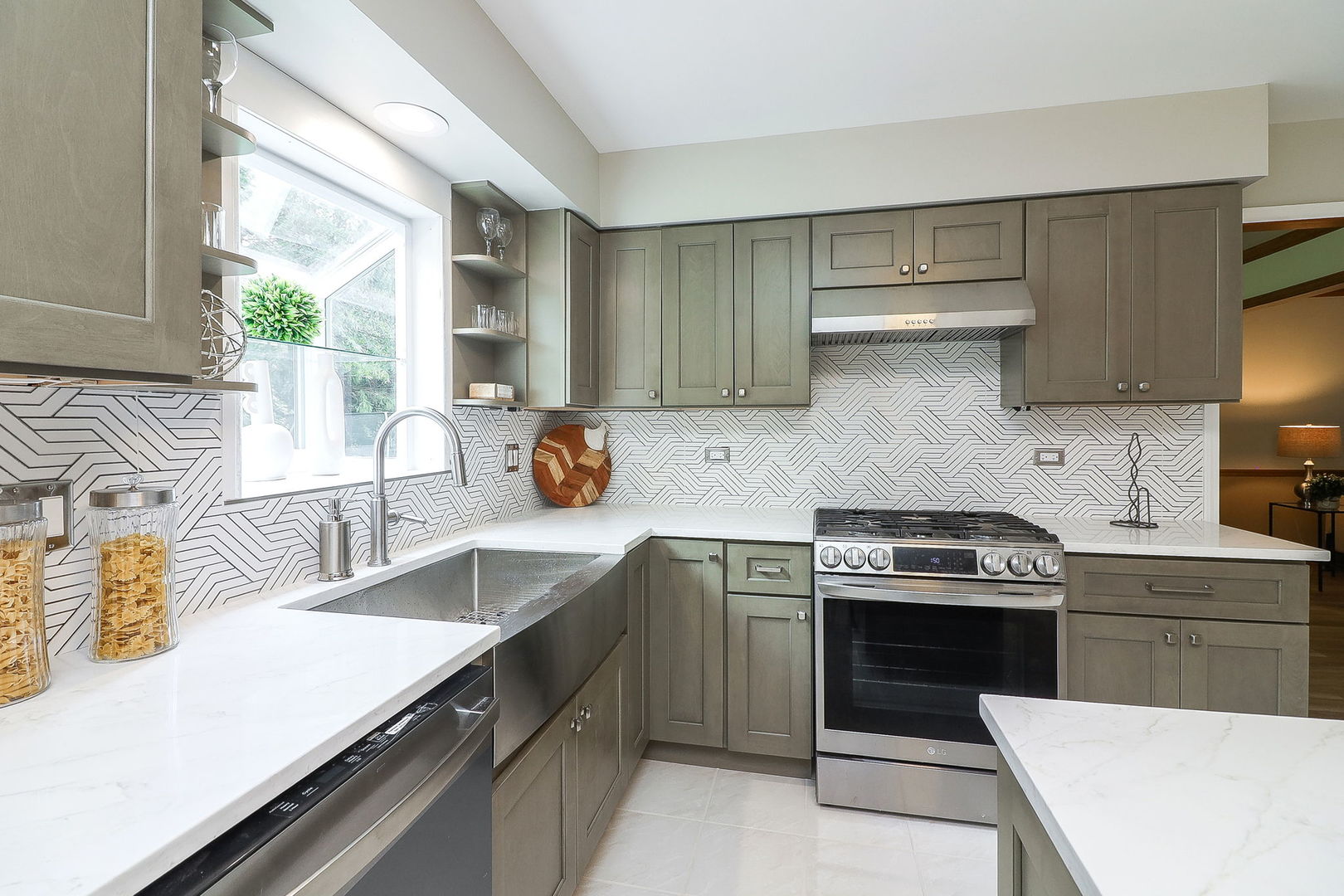 1736 Mundelein Road Naperville, IL 60565 - Photo 8 of 30 a kitchen with a stove sink and cabinets