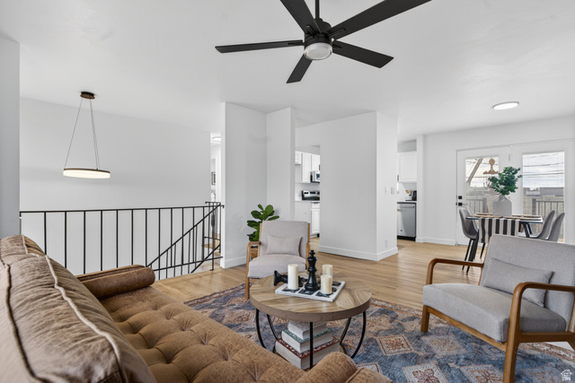 489 Owens Street Layton, UT 84041 - Photo 8 of 25 Living room featuring wood finished floors and a ceiling fan