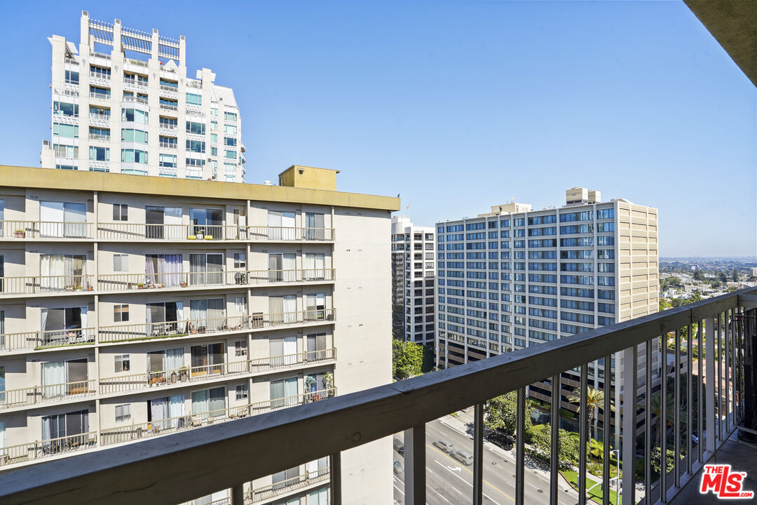 10751 Wilshire Boulevard, Unit PH 6 Los Angeles, CA 90024 - Photo 26 of 41 a view of a tall building from a balcony