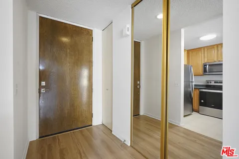 a picture of a bench in a white wall