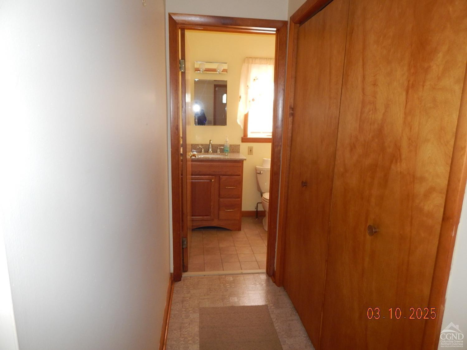 721 Irving Road Greenville, NY 12083 - Photo 13 of 29 a bathroom with a sink and a mirror