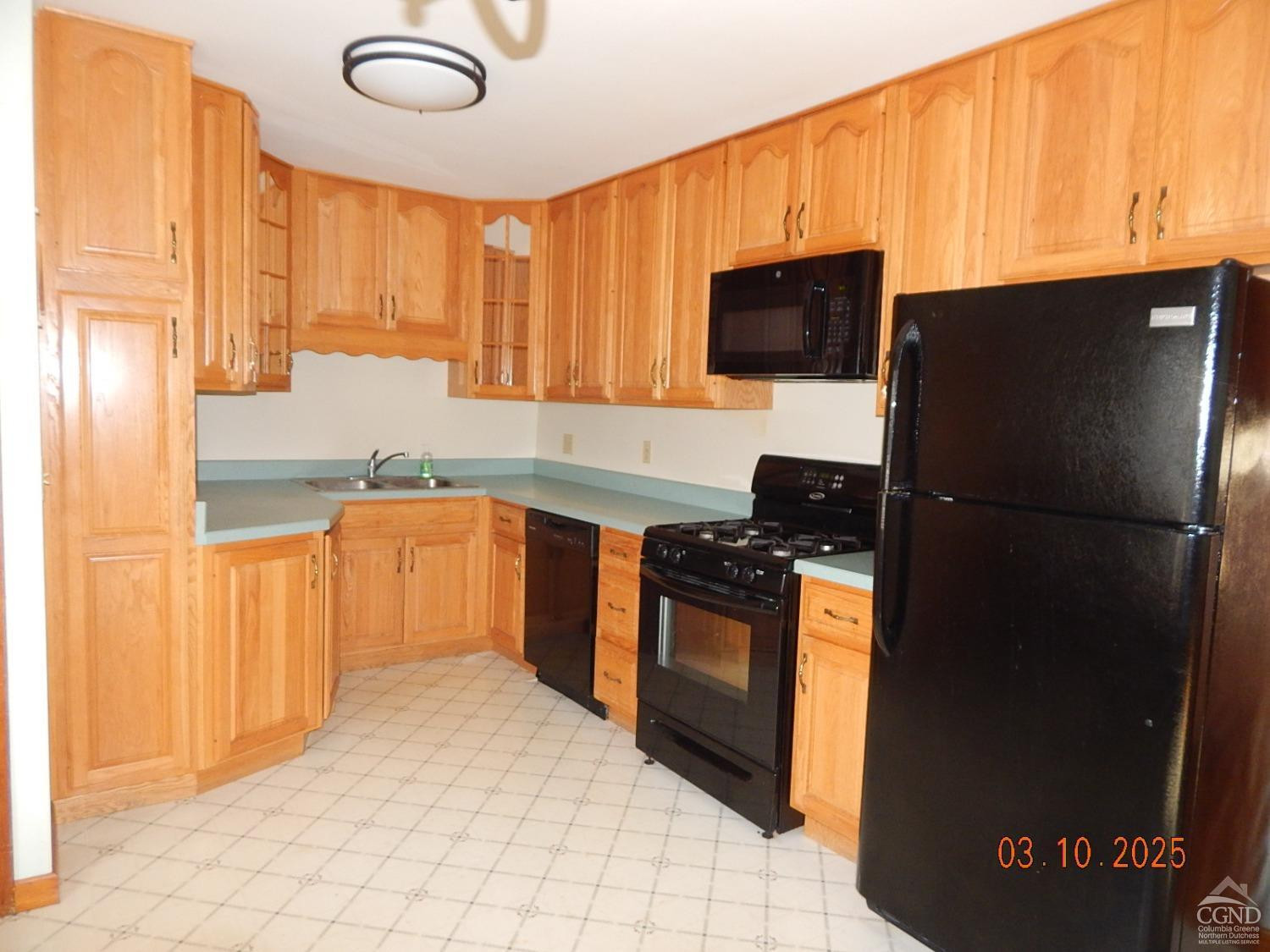 721 Irving Road Greenville, NY 12083 - Photo 18 of 29 a kitchen with stainless steel appliances a refrigerator stove and sink