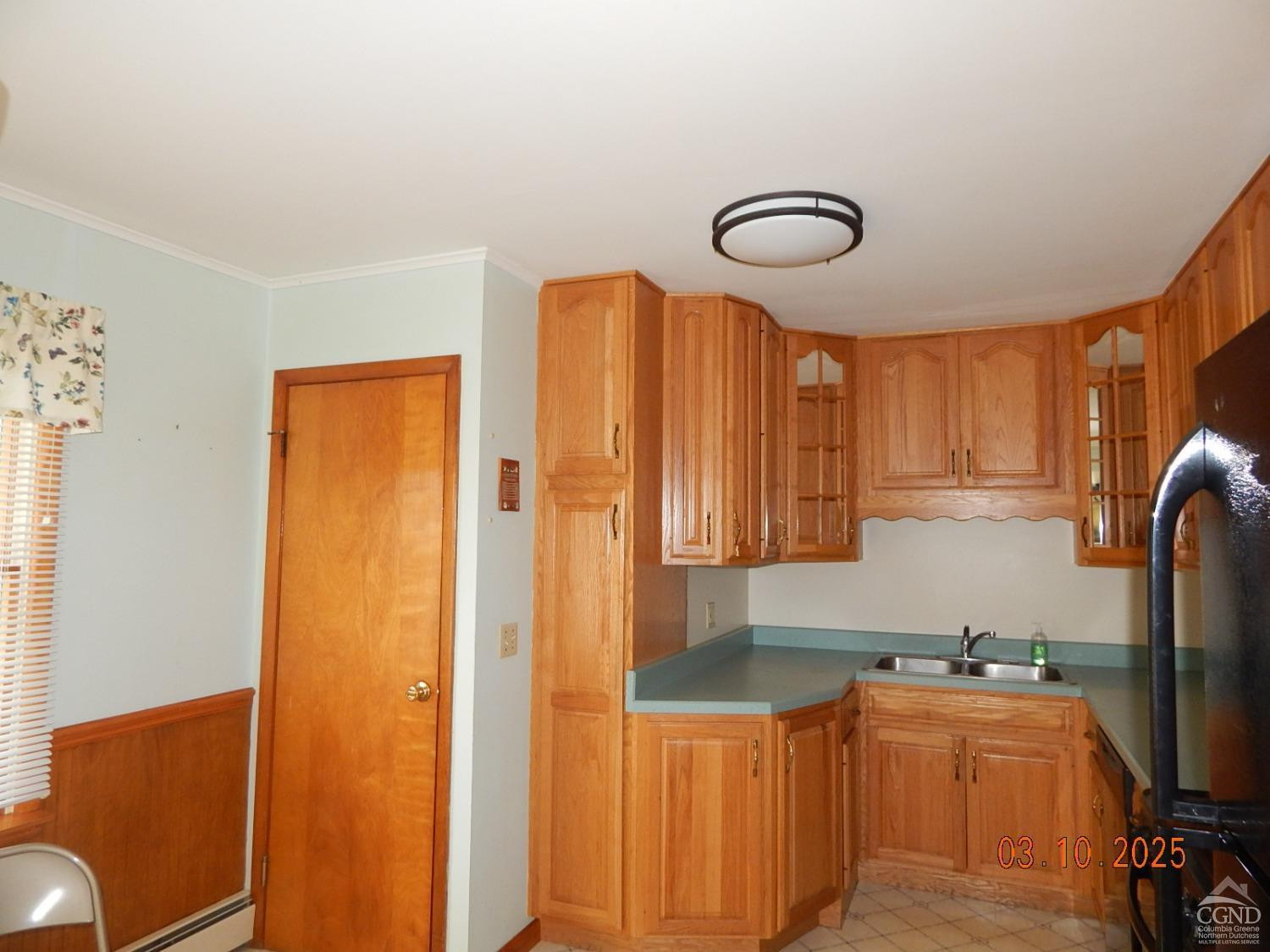 721 Irving Road Greenville, NY 12083 - Photo 19 of 29 a kitchen with stainless steel appliances granite countertop a sink a stove and a refrigerator