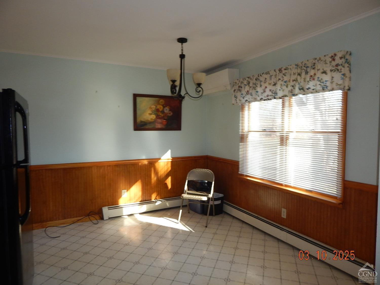 721 Irving Road Greenville, NY 12083 - Photo 20 of 29 a room with furniture and a window