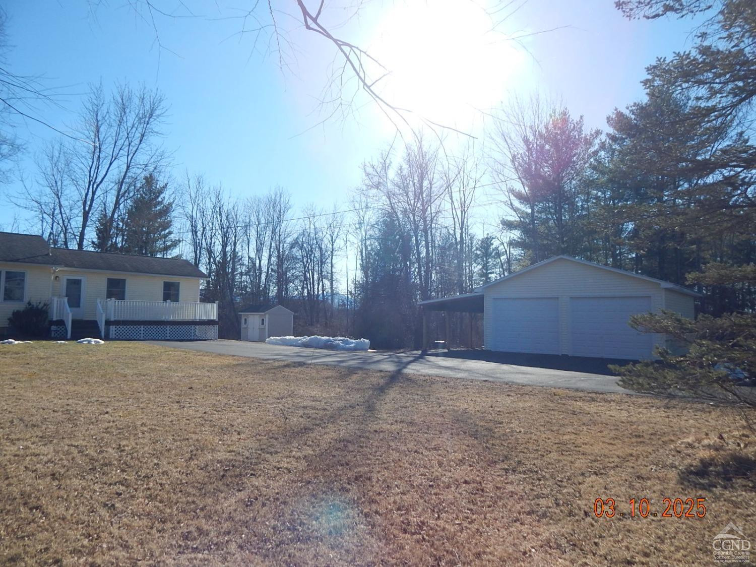 721 Irving Road Greenville, NY 12083 - Photo 2 of 29 a view of large trees with a house