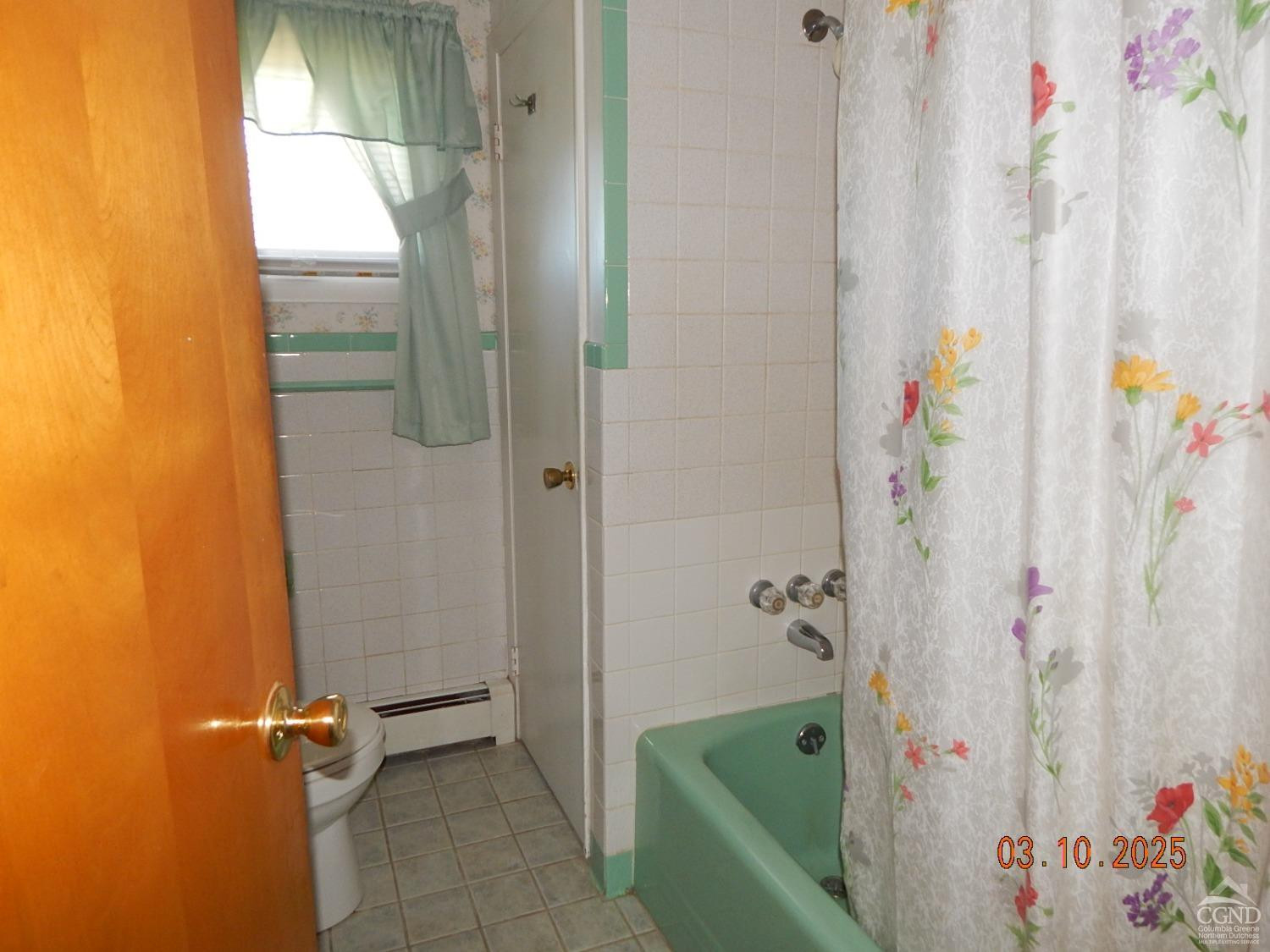 721 Irving Road Greenville, NY 12083 - Photo 22 of 29 a bathroom with a bathtub and shower